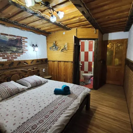 Berloga Hébergement de vacances Mykulychyn